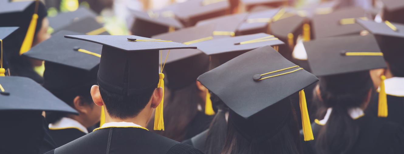 High School Graduation wearing caps and gowns.