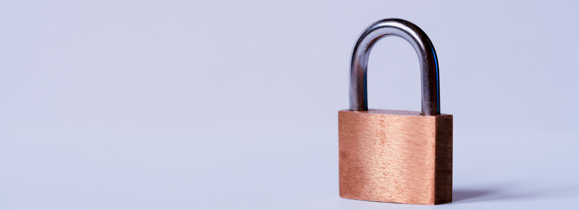 A lock in front of a white background.