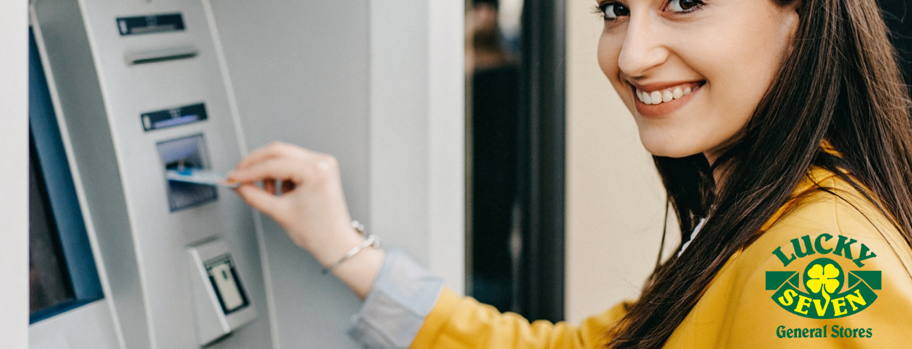 A woman using an ATM